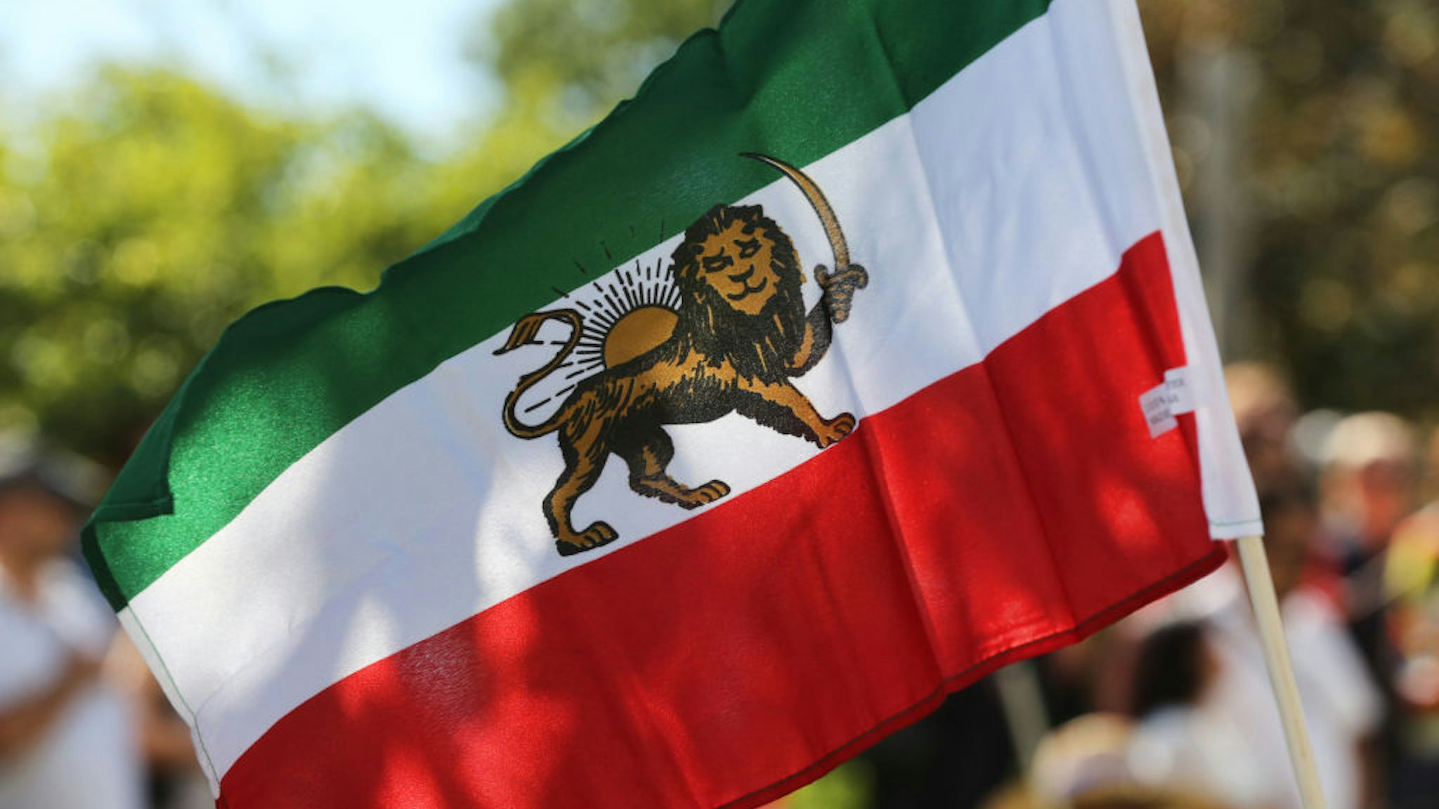 Iranian flag seen during the first ever Persian parade in Toronto, Ontario, Canada, on August 31, 2019.
