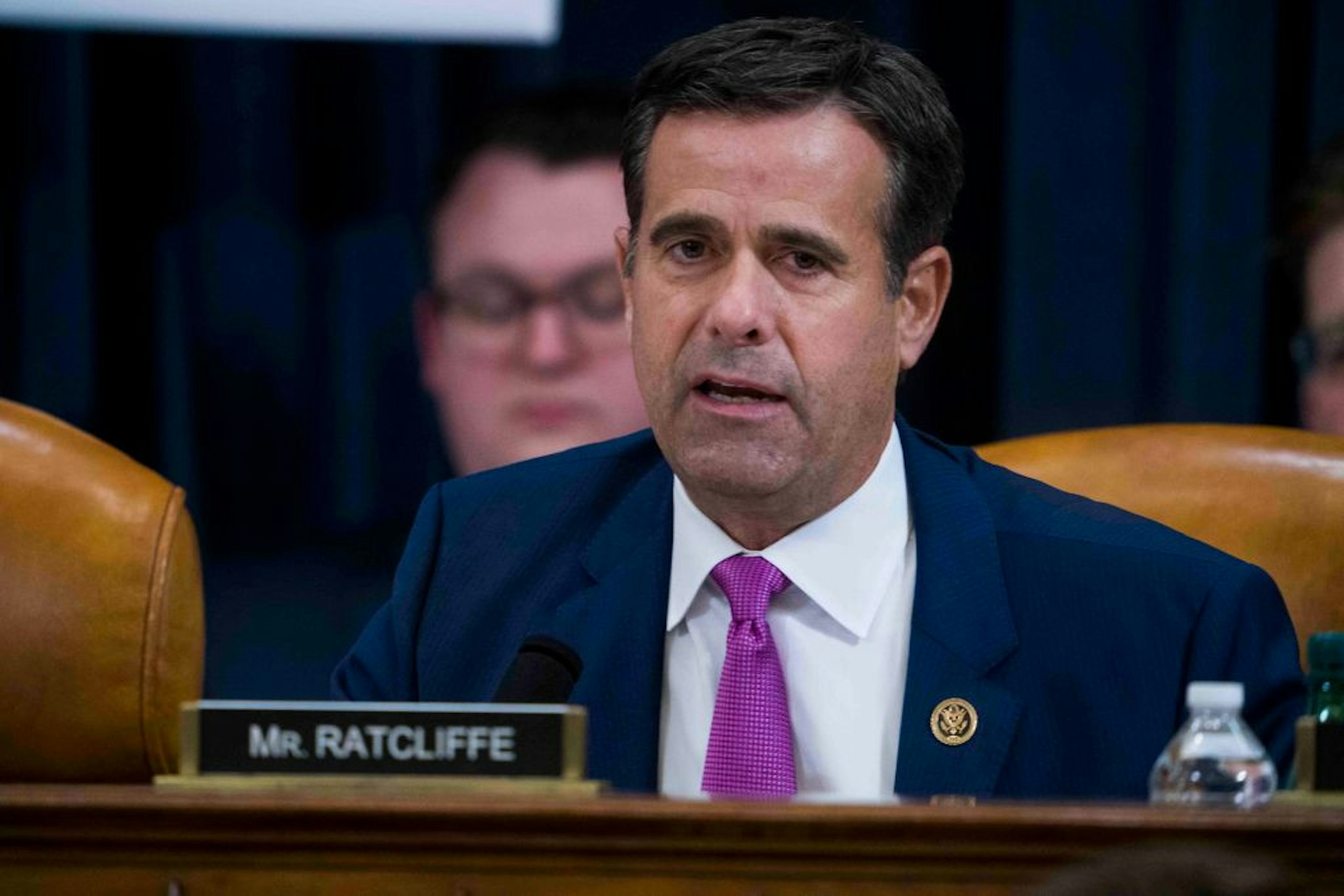 Rep. John Ratcliffe (R-TX) questions Intelligence Committee Minority Counsel Stephen Castor and Intelligence Committee Majority Counsel Daniel Goldman during the House impeachment inquiry hearings in the Longworth House Office Building on Capitol Hill December 9, 2019 in Washington, DC.