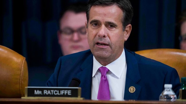 Rep. John Ratcliffe (R-TX) questions Intelligence Committee Minority Counsel Stephen Castor and Intelligence Committee Majority Counsel Daniel Goldman during the House impeachment inquiry hearings in the Longworth House Office Building on Capitol Hill December 9, 2019 in Washington, DC.