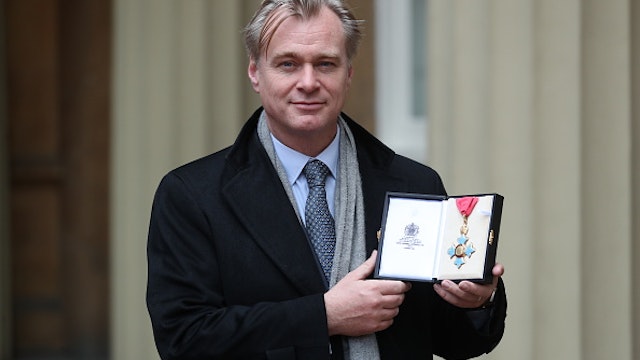 LONDON, ENGLAND - DECEMBER 19: Director Christopher Nolan after he was made a Commander of the British Empire (CBE) following an investiture ceremony at Buckingham Palace on December 19, 2019 in London, England.