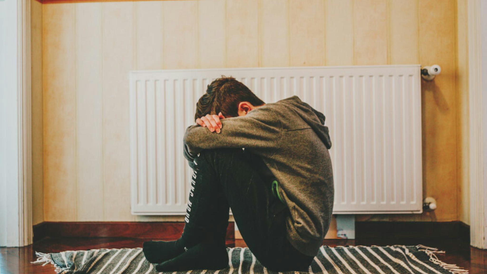 Depressed kid during epidemic quarantine Depressed kid during epidemic quarantine