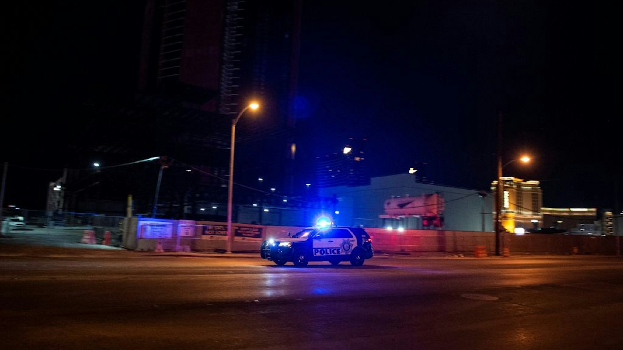A police car makes its way to the scene after a shooting was reported outside Circus Circus hotel and casino, on June 1, 2020,
