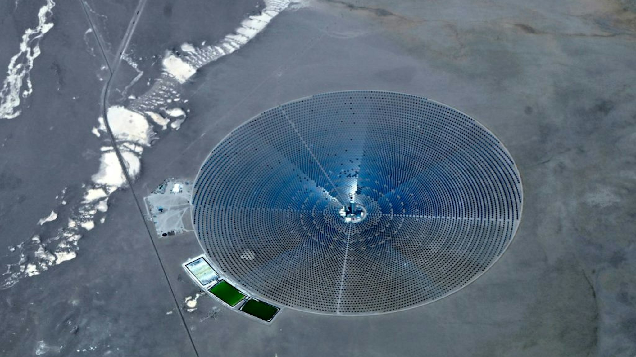 This July 30, 2020, aerial view shows the Crescent Dunes Solar Energy Project located near Tonopah, 190 miles (310 kms) northwest of Las Vegas, Nevada.