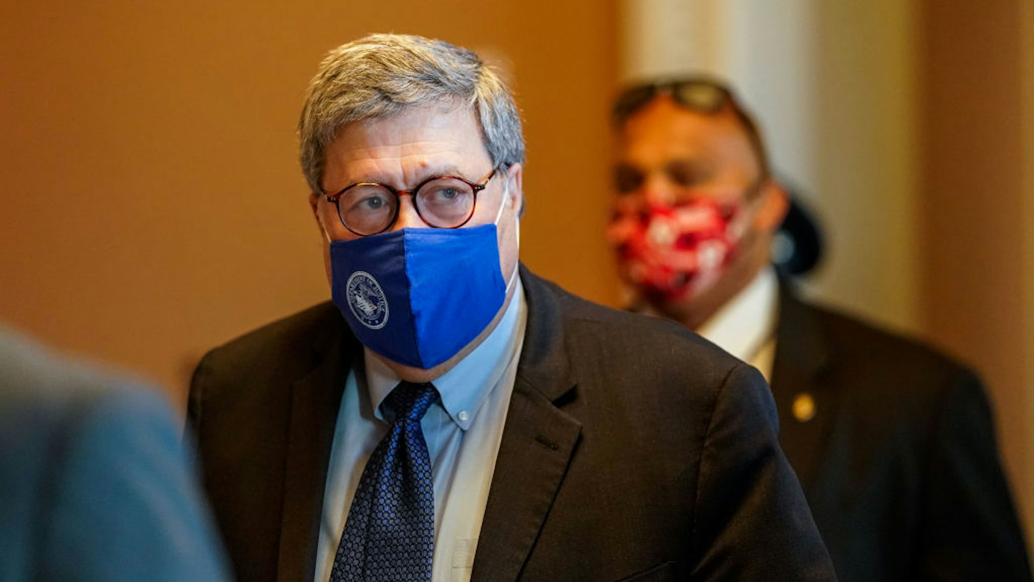 US Attorney General William Barr walks out from the office of Senate Majority Leader Mitch McConnell (D-KY) at the US Capitol Building on Monday, Nov. 9, 2020 in Washington, DC.