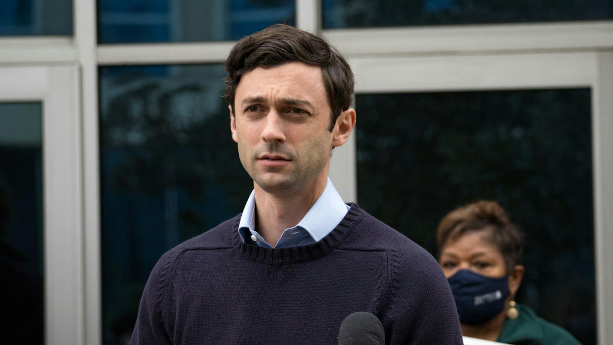Jon Ossoff Jon Ossoff, Democratic candidate for a U.S. Senate seat in Georgia, holds a press conference to discuss Sen. David Perdue's (R-GA) stock trading practices at the IBEW local union headquarters on November 30, 2020 in Atlanta, Georgia.