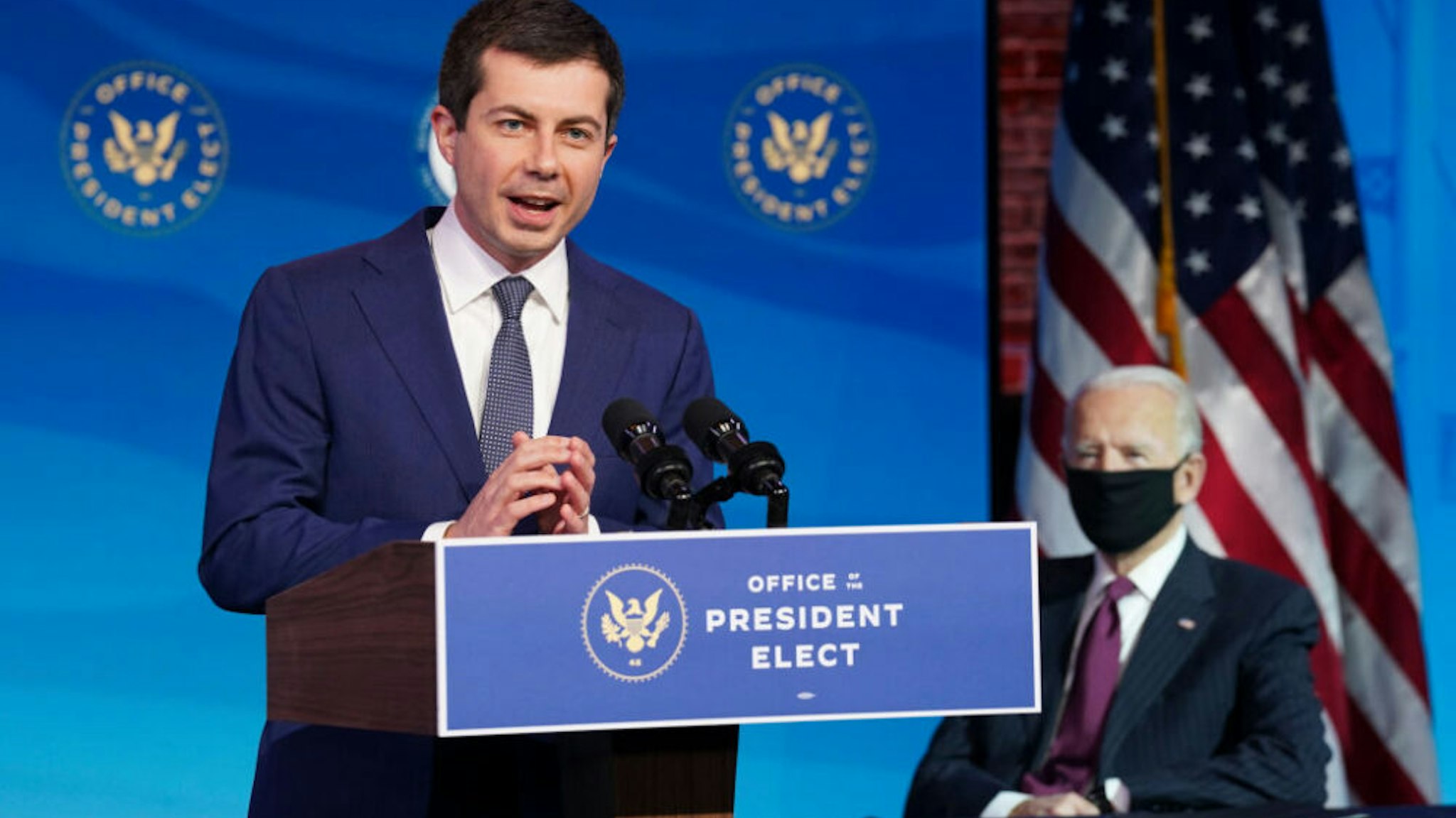 WILMINGTON, DELAWARE - DECEMBER 16: Former Democratic presidential candidate Pete Buttigieg speaks as U.S. President-elect Joe Biden (R) looks on after he was nominated to be Secretary of Transportation during a news conference at Biden's transition headquarters on December 16, 2020 in Wilmington, Delaware.
