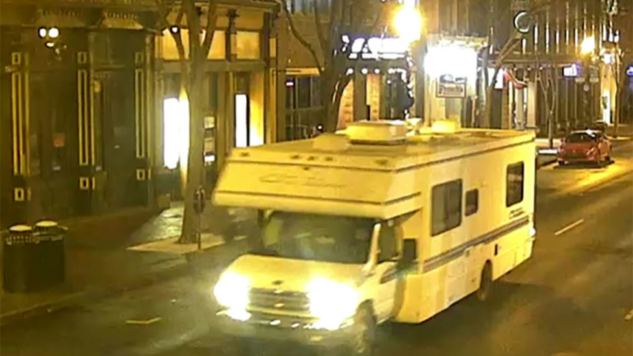 NASHVILLE, TENNESSEE - DECEMBER 25: In this handout image provided by the Metro Nashville Police Department, a screengrab of surveillance footage shows the recreational vehicle suspected of being used in the Christmas day bombing on December 25, 2020 in Nashville, Tennessee. A Hazardous Devices Unit was en route to check on a recreational vehicle which then exploded, extensively damaging some nearby buildings. According to reports, the police believe the explosion to be intentional, with at least 3 injured and human remains found in the vicinity of the explosion. (Photo by Metro Nashville Police Department via Getty Images)