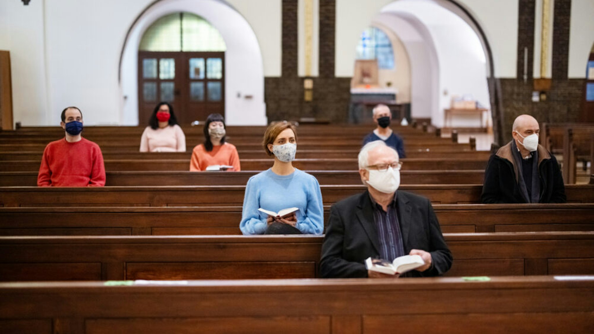 Group of people at church congregation during pandemic
