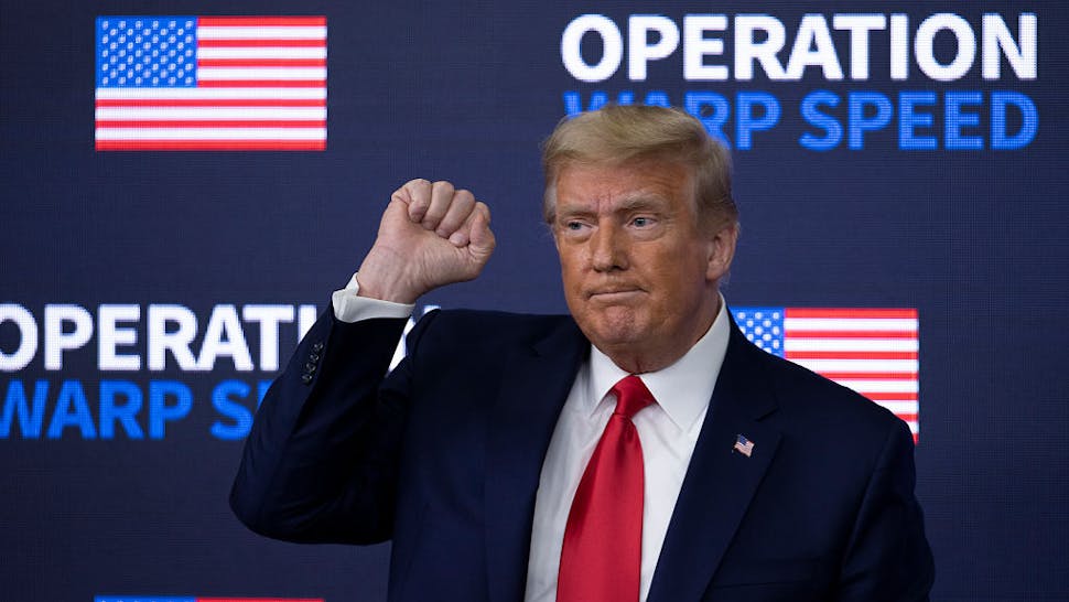 President Trump US President Donald Trump greets the crowd before he leaves at the Operation Warp Speed Vaccine Summit on December 08, 2020 in Washington, DC.