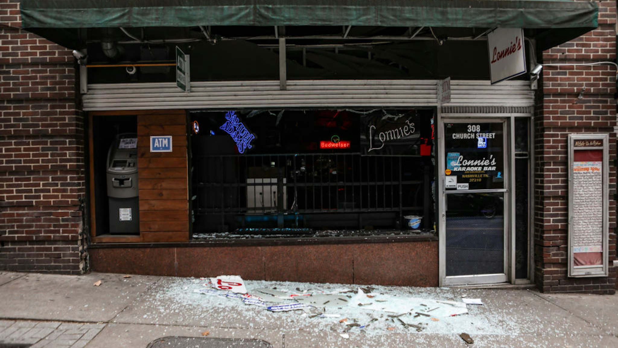 NASHVILLE, TN - DECEMBER 25: Windows are blown out of a business on Church St after an explosion on December 25, 2020 in Nashville, Tennessee. According to initial reports, a vehicle exploded downtown in the early morning hours. (Photo by Thaddaeus McAdams/Getty Images)