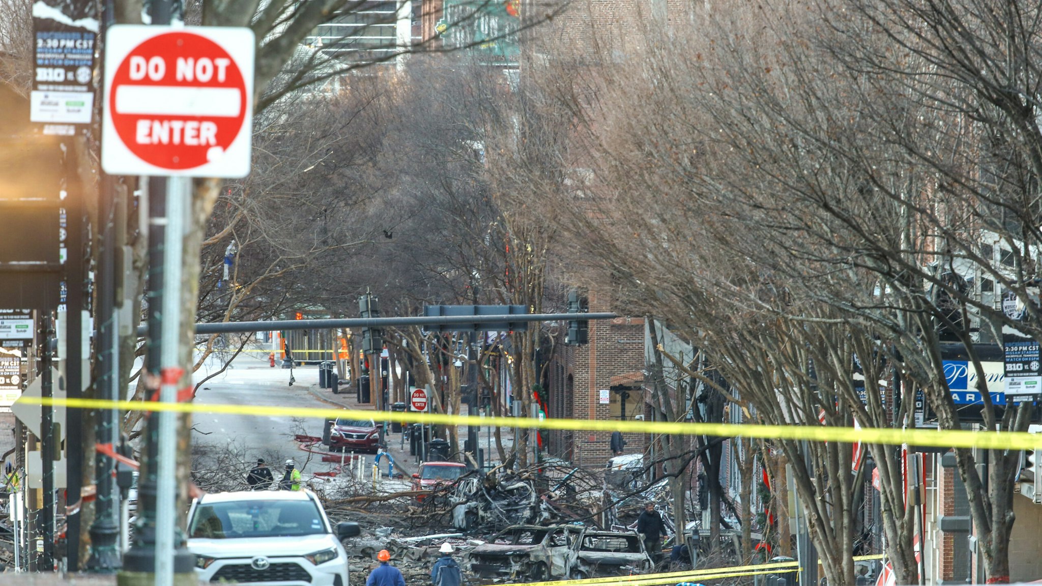 Police close off an area damaged by an explosion on Christmas morning on December 25, 2020 in Nashville, Tennessee.