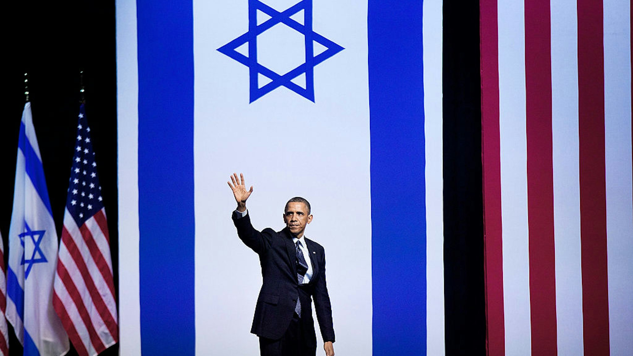 JERUSALEM, ISRAEL - MARCH 21: (ISRAEL OUT) U.S. President Barack Obama waves to the crowed at the end of his speech to Israeli students at the International Convention Center on March 21, 2013 in Jerusalem, Israel. This is Obama's first visit as president to the region and his itinerary includes meetings with the Palestinian and Israeli leaders as well as a visit to the Church of the Nativity in Bethlehem. (Photo by Uriel Sinai/Getty Images)