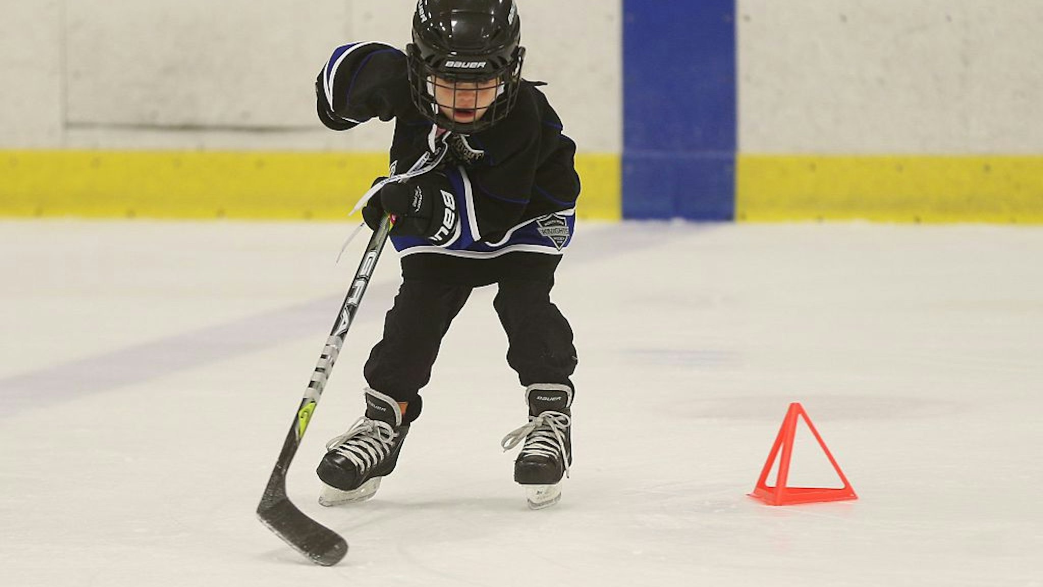 A little girl does some drills... A mother -daughter Skate/shinny was held today at Leaside Memorial Arena.