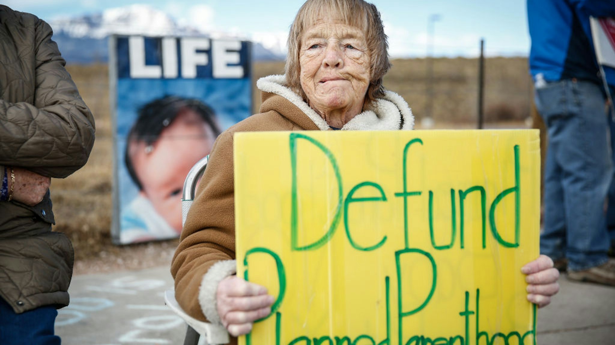 COLORADO SPRINGS, CO - FEBRUARY 11: Pro-Life protestor Rose Ann Schienle of Colorado Springs, Colorado holds a sign while demonstrating outside of the Colorado Springs Westside Health Center February 11, 2017 in Colorado Springs, Colorado. The protest is part of nationwide demonstrations that were held at Planned Parenthood locations in more than 200 cities in an attempt to raise support for restricting women's ability to have abortions in the United States. (Photo by Marc Piscotty/Getty Images)