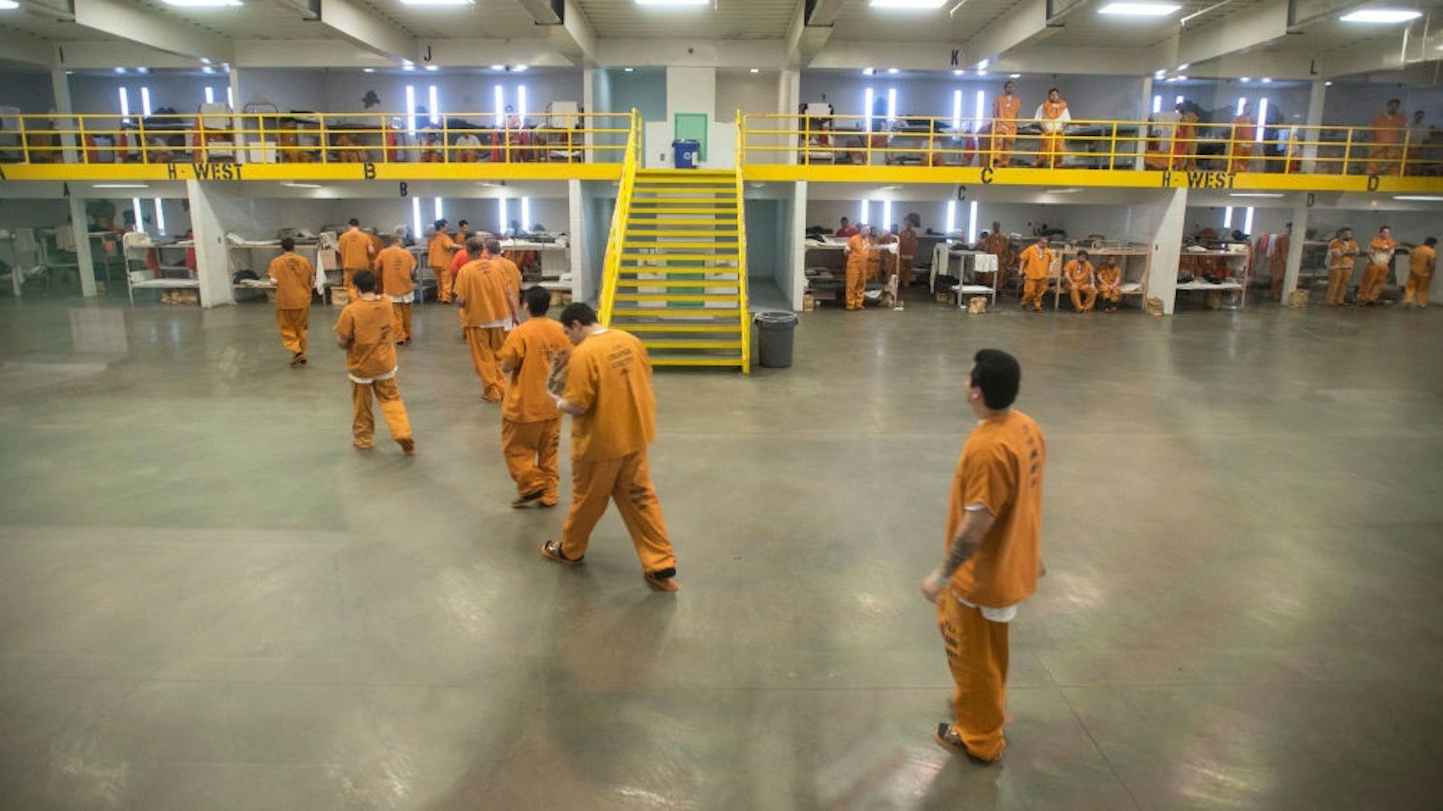 ORANGE, CA - MARCH 14: Detainees in a barrack holding area at the Theo Lacy Facility in Orange, California, on Tuesday, March 14, 2017. The Orange County sheriff conducted a media tour of the jail that included the intake area, the kitchen, an isolation unit and a modular holding area. (Photo by Jeff Gritchen/Digital First Media/Orange County Register via Getty Images)