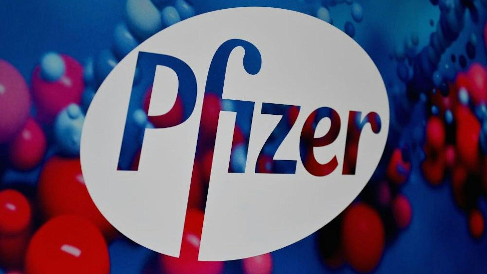 The Pfizer logo is seen at the Pfizer Inc. headquarters on December 9, 2020 in New York City.