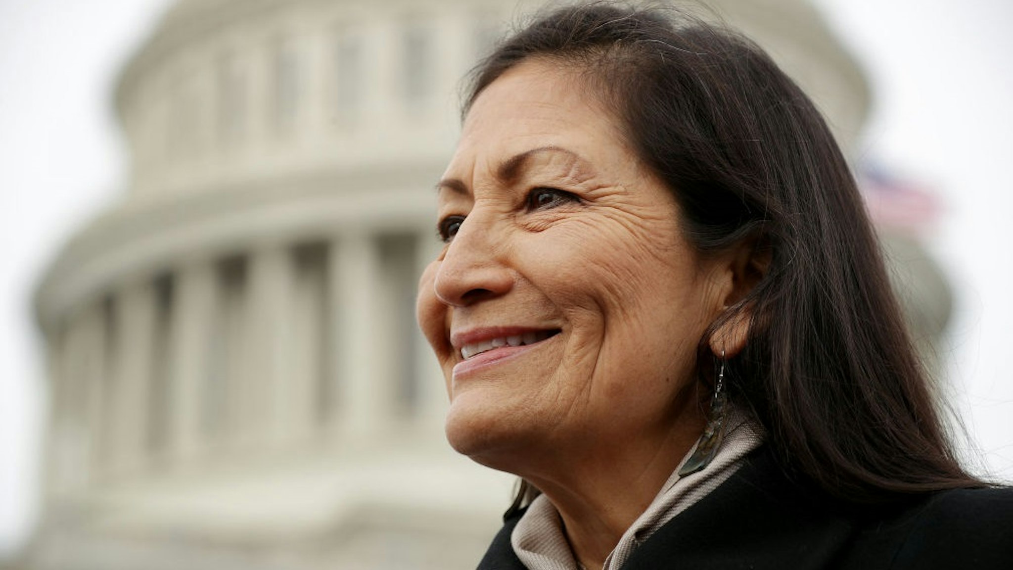 WASHINGTON, DC - JANUARY 04: Rep. Debra Haaland (D-NM) talks with reporters after a portrait with her fellow House Democratic women in front of the U.S. Capitol January 04, 2019 in Washington, DC.