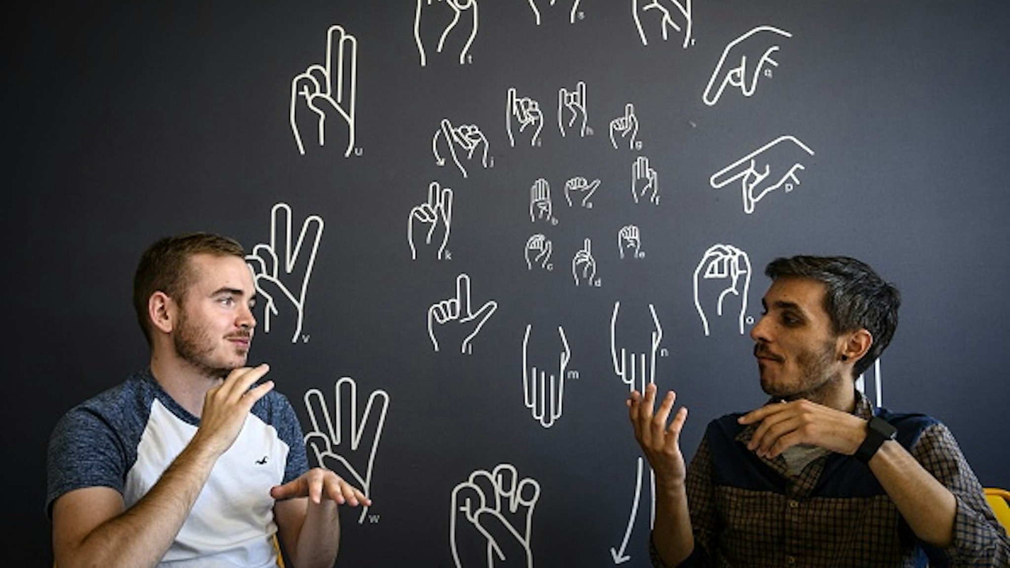 Hearing-impaired students take part in a sign language webdesign course at "Signes &amp; Formations" on the Lyon Digital Campus, on May 22, 2019.