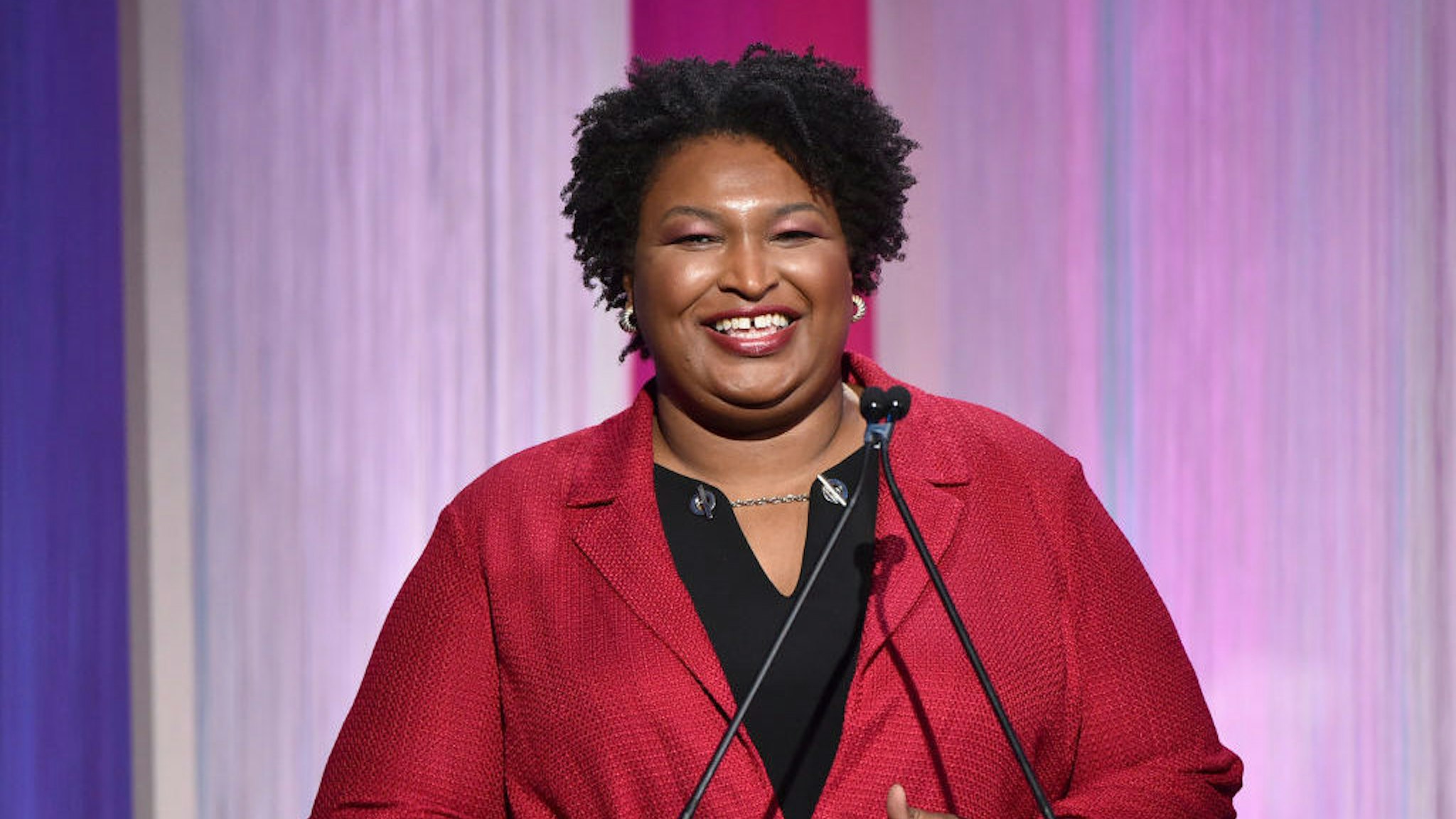 HOLLYWOOD, CALIFORNIA - DECEMBER 11: Politician Stacey Abrams speaks onstage during The Hollywood Reporter's Power 100 Women in Entertainment at Milk Studios on December 11, 2019 in Hollywood, California. (Photo by Alberto E. Rodriguez/Getty Images for The Hollywood Reporter)