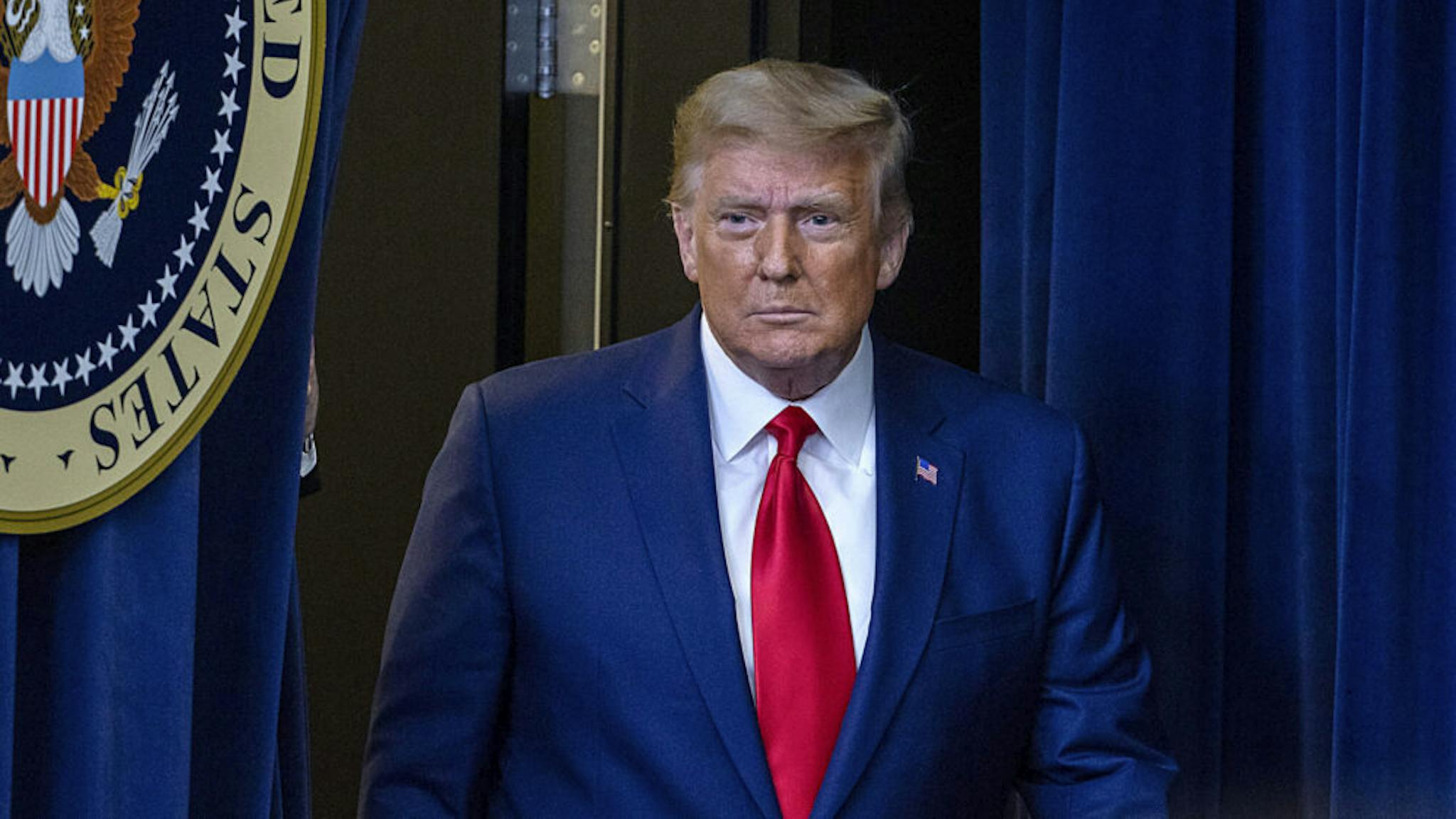 White House Holds COVID-19 Vaccine Summit WASHINGTON, DC - DECEMBER 08: US President Donald Trump arrives to speak at the Operation Warp Speed Vaccine Summit. on December 08, 2020 in Washington, DC. The president signed an executive order stating the US would provide vaccines to Americans before aiding other nations.