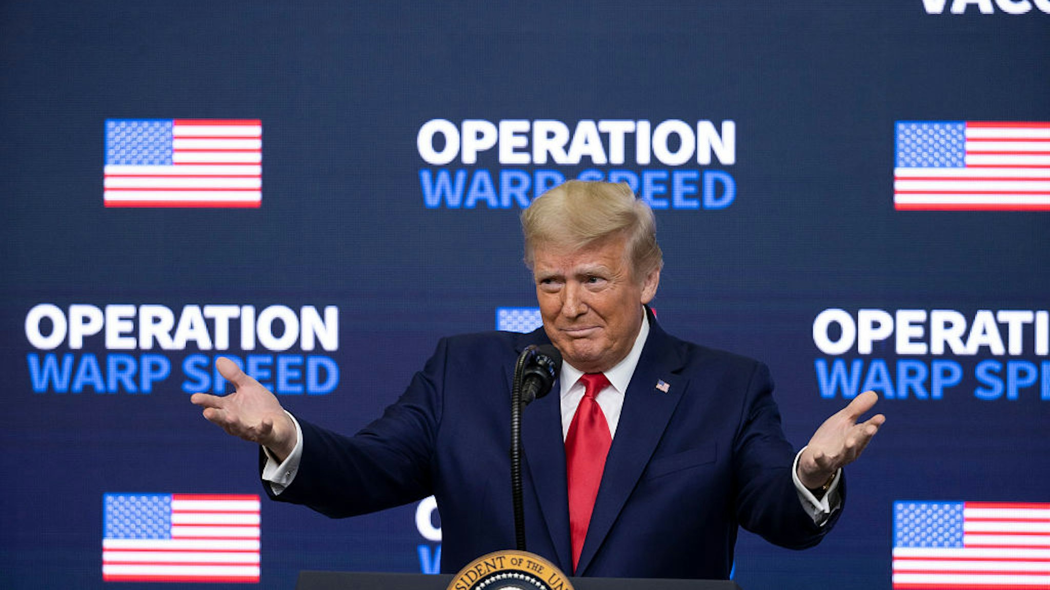 WASHINGTON, DC - DECEMBER 08: US President Donald Trump speaks at the Operation Warp Speed Vaccine Summit on December 08, 2020 in Washington, DC. The president signed an executive order stating the US would provide vaccines to Americans before aiding other nations.