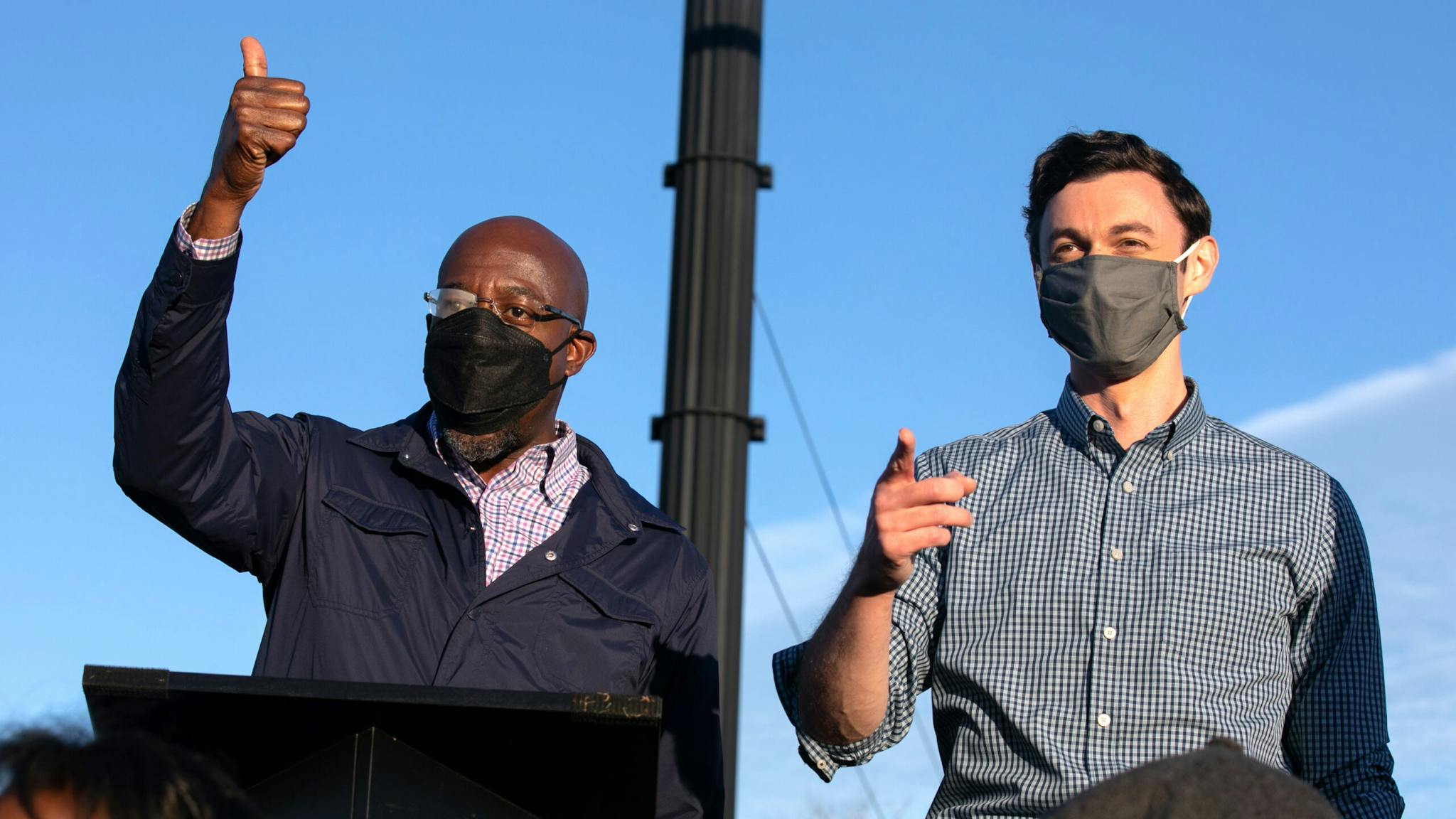 Reverend Warnock And Jon Ossoff Campaign For Georgia Runoff Senate Elections MARIETTA, GA - NOVEMBER 15: Democratic U.S. Senate candidates Jon Ossoff (R) and Raphael Warnock (L) of Georgia hold a rally on November 15, 2020 in Marietta, Georgia. Ossoff and Warnock face incumbent U.S. Sens. David Purdue (R-GA) and Kelly Loeffler (R-GA) respectively in a January 5 runoff election.