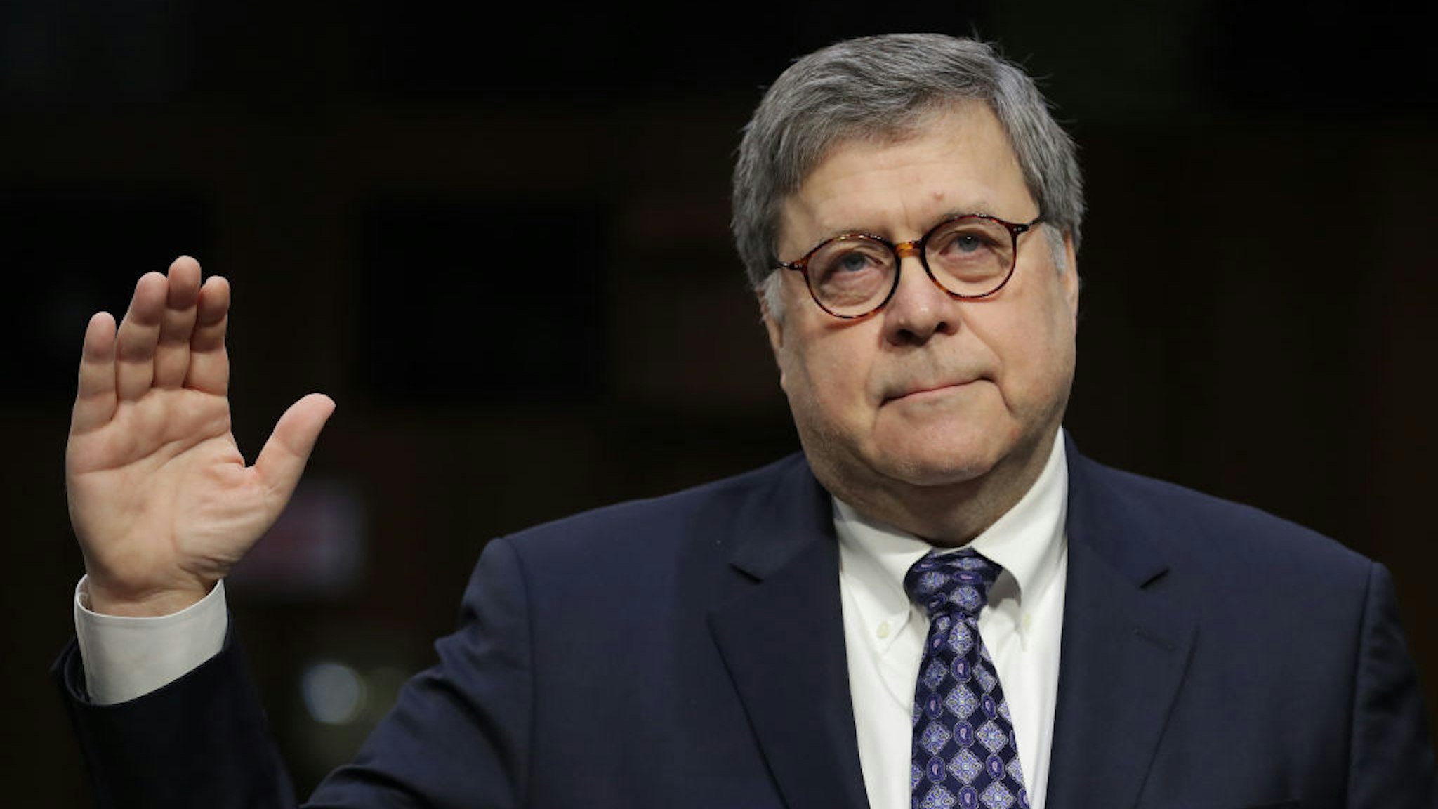 WASHINGTON, DC - JANUARY 15: U.S. Attorney General nominee William Barr (C) is sworn in prior to testifying at his confirmation hearing before the Senate Judiciary Committee January 15, 2019 in Washington, DC. Barr, who previously served as Attorney General under President George H. W. Bush, is expected to be confronted about his views on the investigation being conducted by special counsel Robert Mueller. (Photo by Chip Somodevilla/Getty Images)