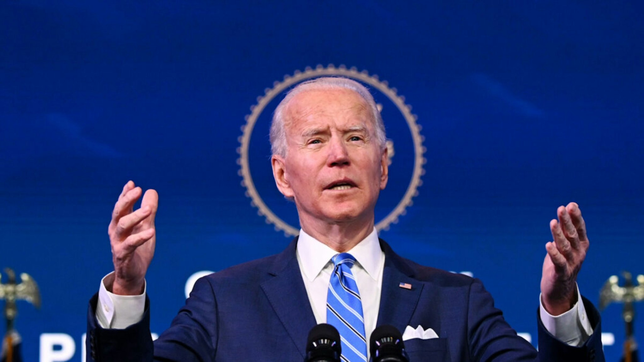 US President-elect Joe Biden delivers remarks on the public health and economic crises at The Queen theater in Wilmington, Delaware on January 14, 2021.