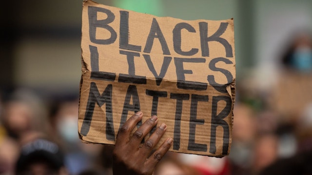 SEATTLE, WA - JUNE 14: Black Lives Matter protesters rally at Westlake Park before marching through the downtown area on June 14, 2020 in Seattle, United States.