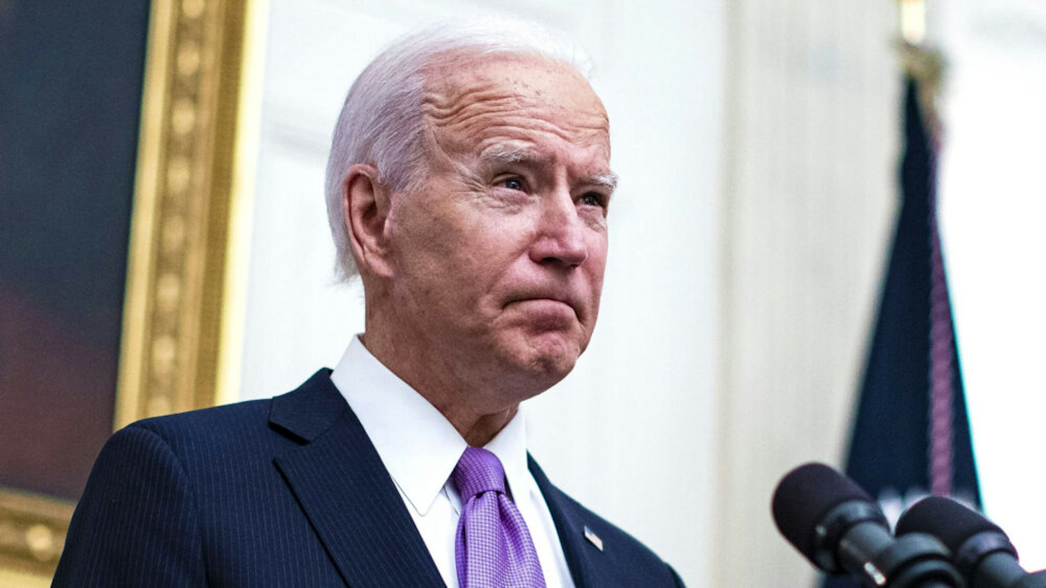 U.S. President Joe Biden pauses while speaking on his administrations Covid-19 response in the State Dining Room of the White House in Washington, D.C., U.S., on Thursday, Jan. 21, 2021. Biden in his first full day in office plans to issue a sweeping set of executive orders to tackle the raging Covid-19 pandemic that will rapidly reverse or refashion many of his predecessor's most heavily criticized policies.