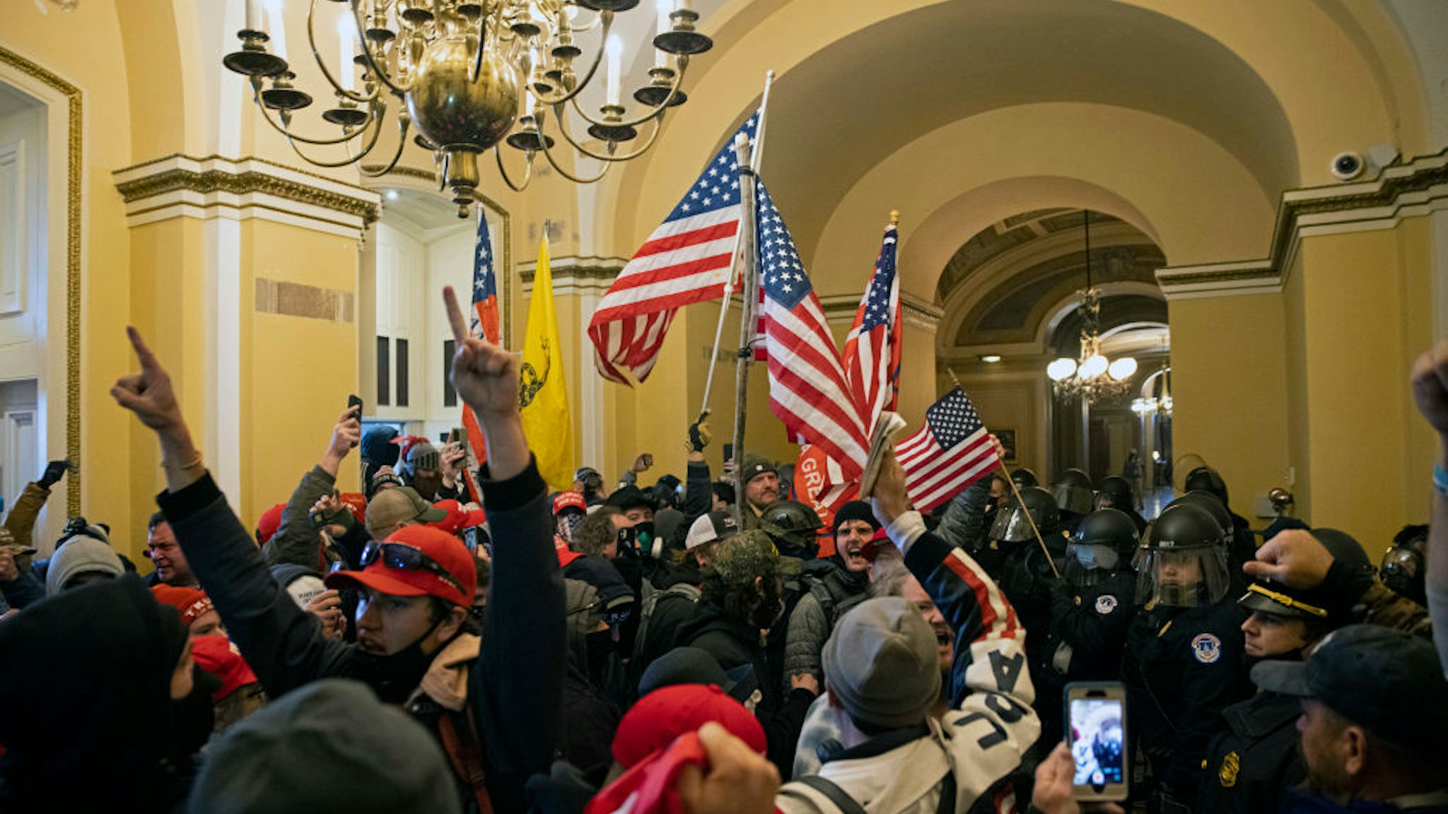 WASHINGTON, DC - JANUARY 06: Supporters of US President Donald Trump protest inside the US Capitol on January 6, 2021, in Washington, DC. Demonstrators breeched security and entered the Capitol as Congress debated the 2020 presidential election Electoral Vote Certification.