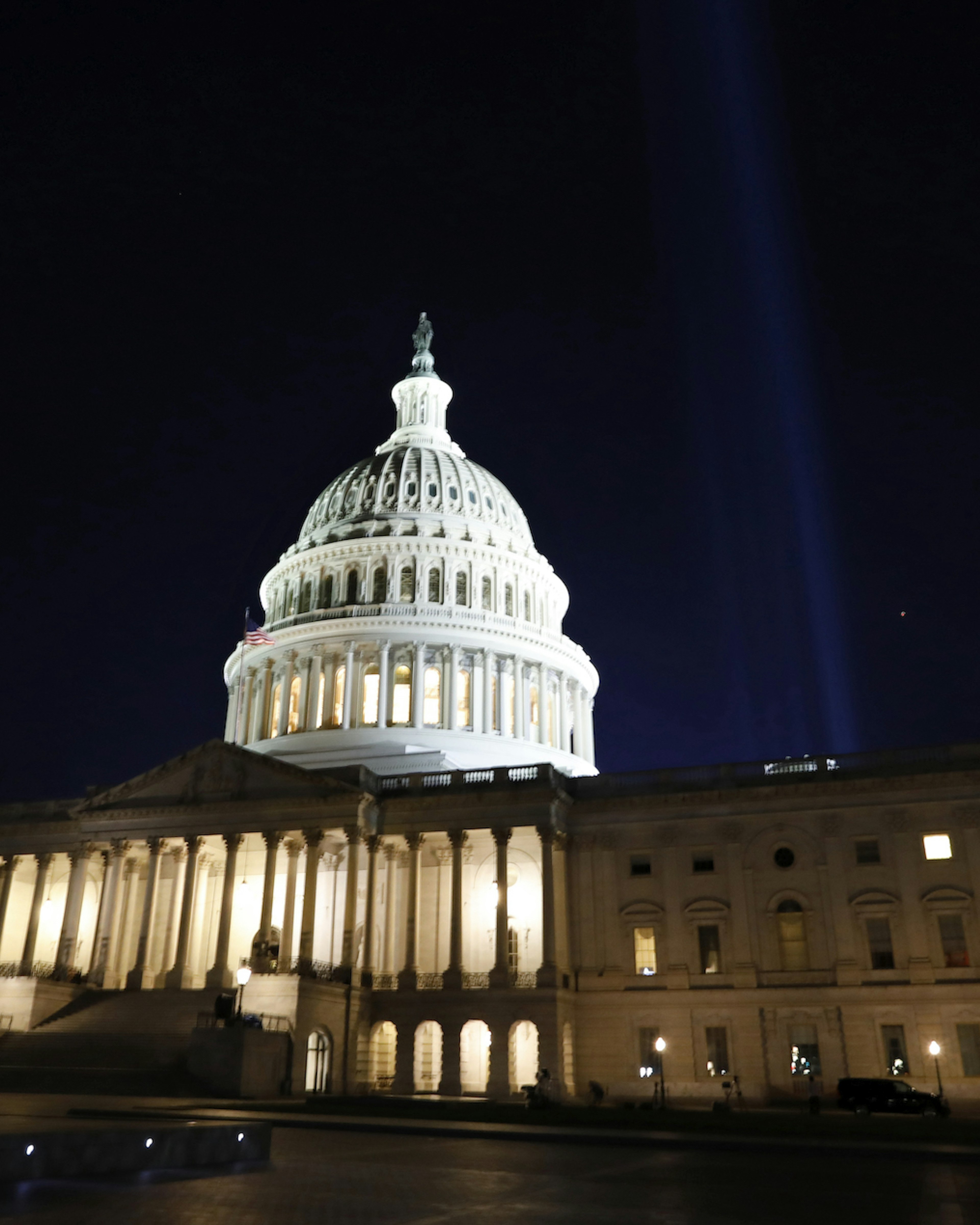 On the day night before the inauguration of President Elect Joe Biden the U.S. Capitol is lite up for the occasion. (Carolyn Cole / Los Angeles Times)