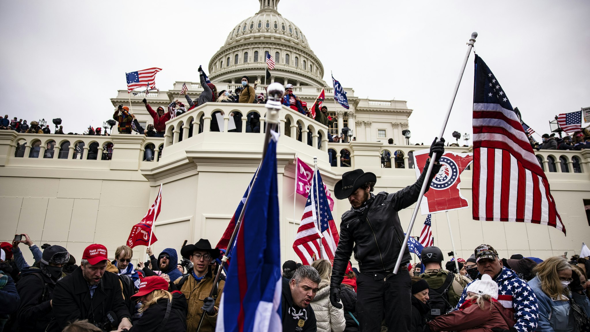 Pro-Trump supporters storm the US Capitol following a rally with President Donald Trump on January 6, 2021 in Washington, DC. Trump supporters gathered in the nation's capital today to protest the ratification of President-elect Joe Biden's Electoral College victory over President Trump in the 2020 election. (Photo by Samuel Corum/Getty Images)