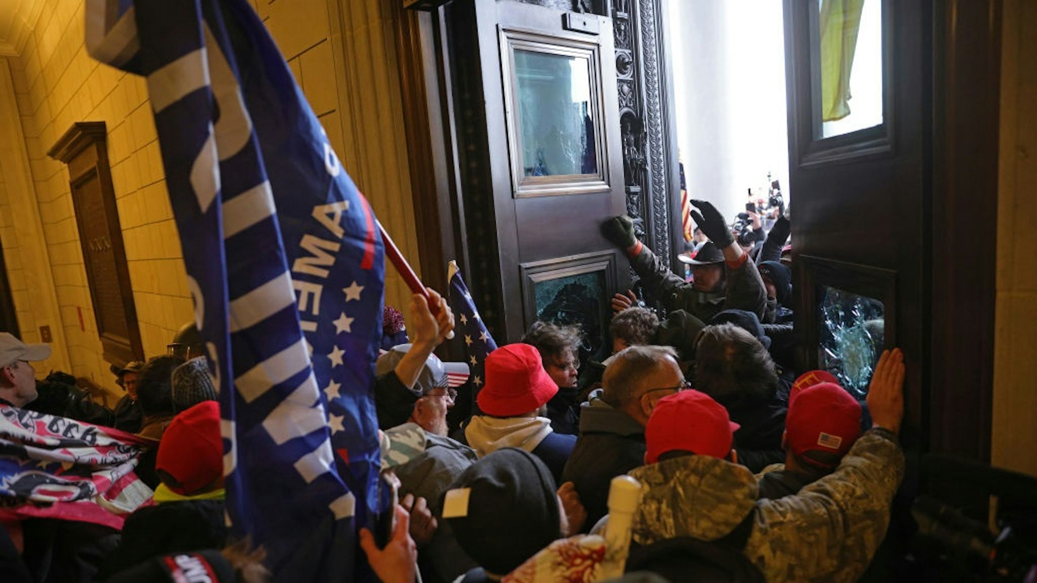 WASHINGTON, DC - JANUARY 06: Protesters supporting U.S. President Donald Trump break into the U.S. Capitol on January 06, 2021 in Washington, DC.