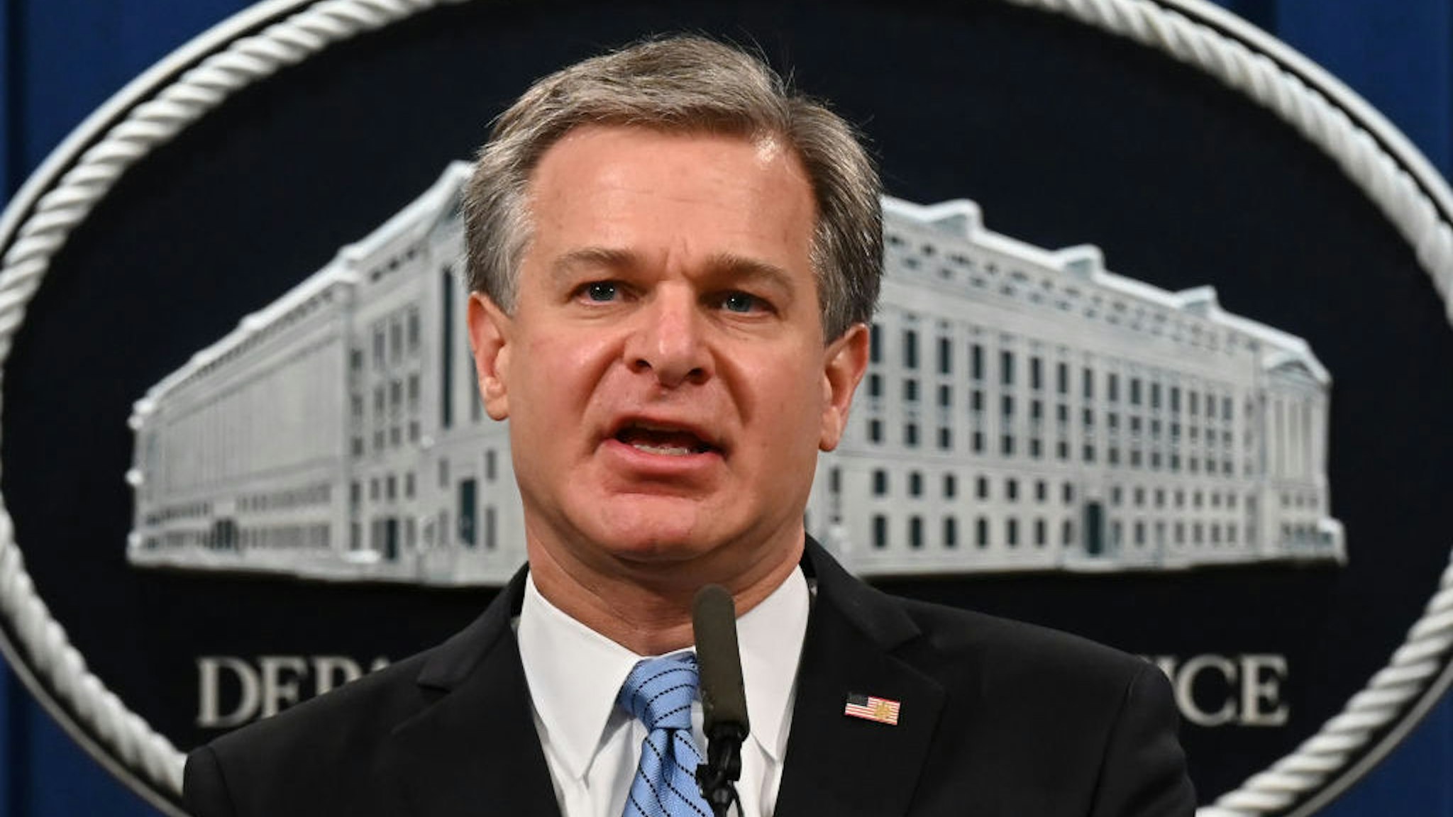 Christopher Wray, director of the Federal Bureau of Investigation (FBI), speaks during a news conference at the Department of Justice in Washington, D.C., U.S., on Wednesday, Oct. 7, 2020. U.S. authorities announced two Islamic State militants, tied to beheadings and other acts of violence against Western hostages including four Americans, will face trial in federal court in the Eastern District of Virginia. Photographer: Jim Watson/AFP/Bloomberg
