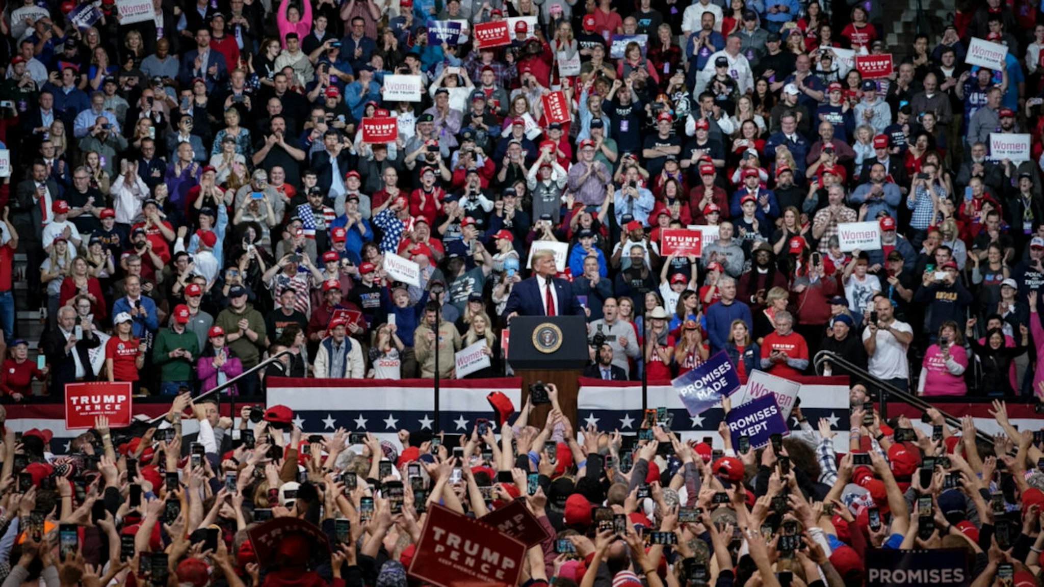 Supporters cheer as U.S. President Donald Trump arrives for a "Keep America Great" rally at Southern New Hampshire University Arena on February 10, 2020 in Manchester, New Hampshire.