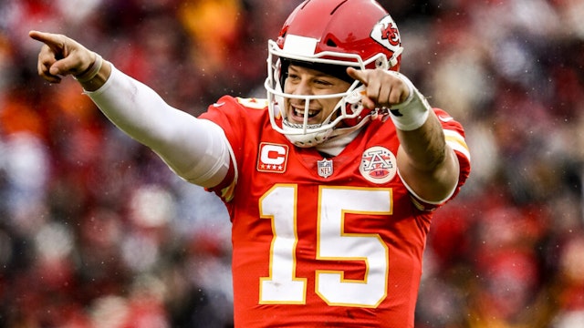 KANSAS CITY, MO - JANUARY 12: Patrick Mahomes #15 of the Kansas City Chiefs points to the sidelines in celebration after throwing a touchdown against the Kansas City Chiefs during the first quarter of the AFC Divisional Round playoff game at Arrowhead Stadium on January 12, 2019 in Kansas City, Missouri.