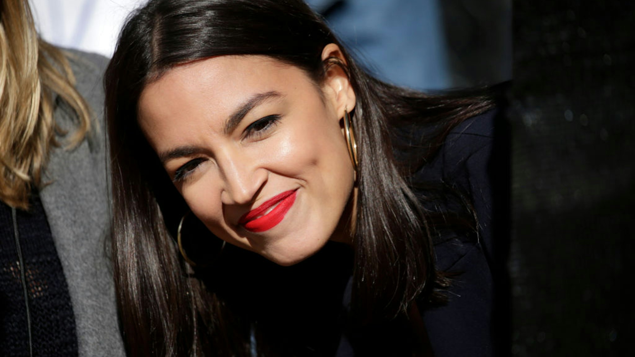 Rep. Alexandria Ocasio-Cortez (D-NY) attends a rally for Democratic presidential candidate, Sen. Bernie Sanders (I-VT) in Queensbridge Park on October 19, 2019 in the Queens borough of New York City.