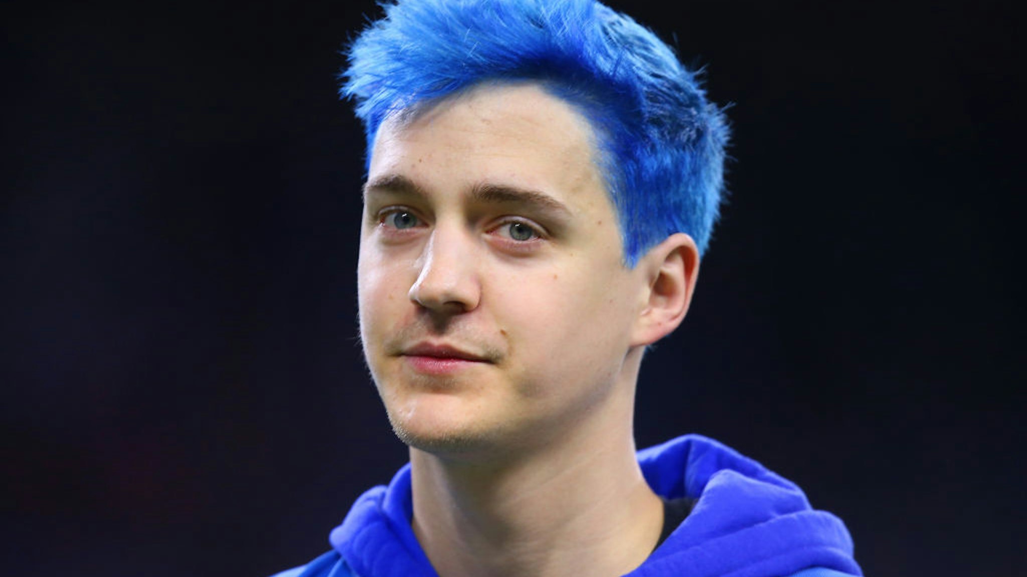 Professional gamer and internet personality Richard Tyler Blevins, known as Ninja, walks off the field after the coin toss where he was serving as an honorary captain for the Lions NFL football game against the New York Giants in Detroit, Michigan USA, on Sunday, October 27, 2019. (Photo by Amy Lemus/NurPhoto via Getty Images)