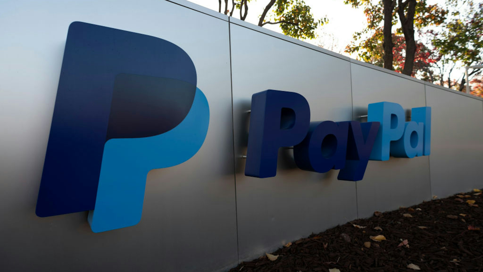 PayPal logo can be seen at its office in San Jose, California, United States on November 23, 2019. PayPal has agreed to acquire Honey Science Corporation, a rapidly-growing technology platform for shopping and rewards, for approximately $4 billion. (Photo by Yichuan Cao/NurPhoto via Getty Images)