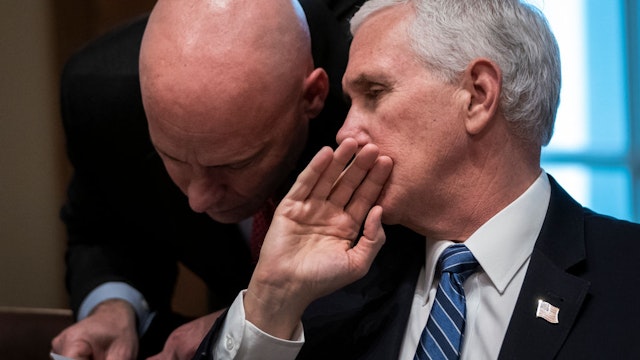 U.S. Vice President Mike Pence and his chief of staff Mark Short confer during a meeting with the White House Coronavirus Task Force and pharmaceutical executives in Cabinet Room of the White House on March 2, 2020 in Washington, DC.