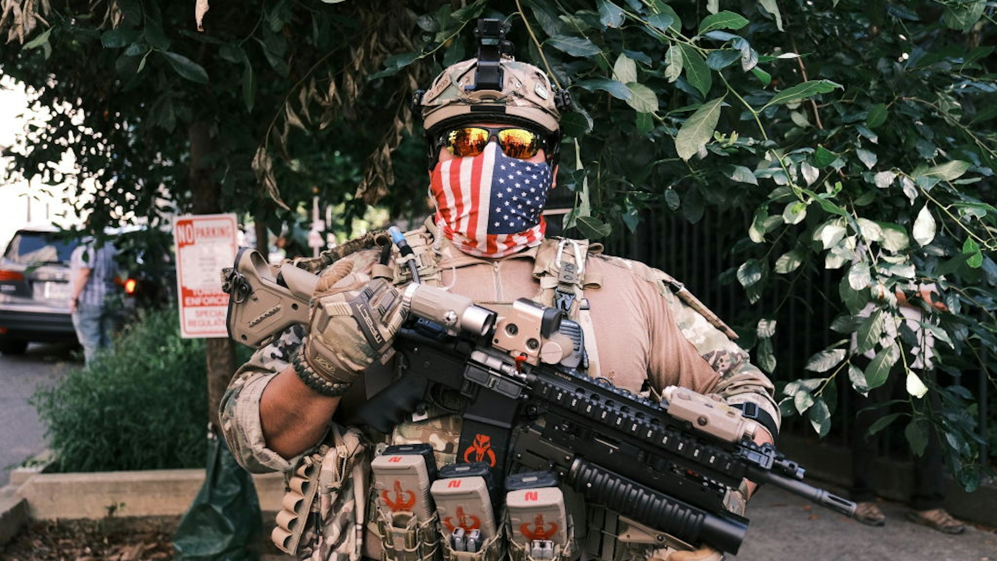 RICHMOND, VA - JULY 04: A man in full military gear pose for photo holding a gun during an open carry protest on July 4, 2020 in Richmond, Virginia. People attended an event in Virginia tagged "Stand with Virginia, Support the 2nd Amendment". (Photo by Eze Amos/Getty Images)