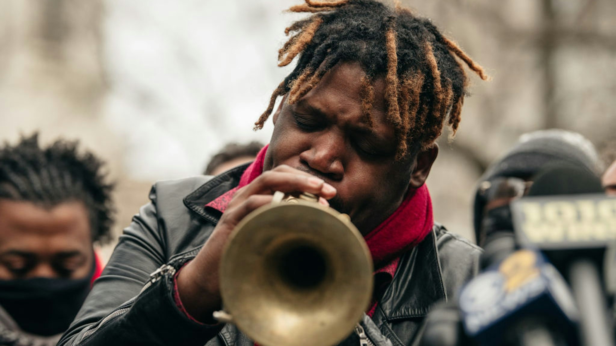 Jazz musician Keyon Harrold plays trumpet at a press conference held in lower Manhattan on December 30, 2020 in New York City.