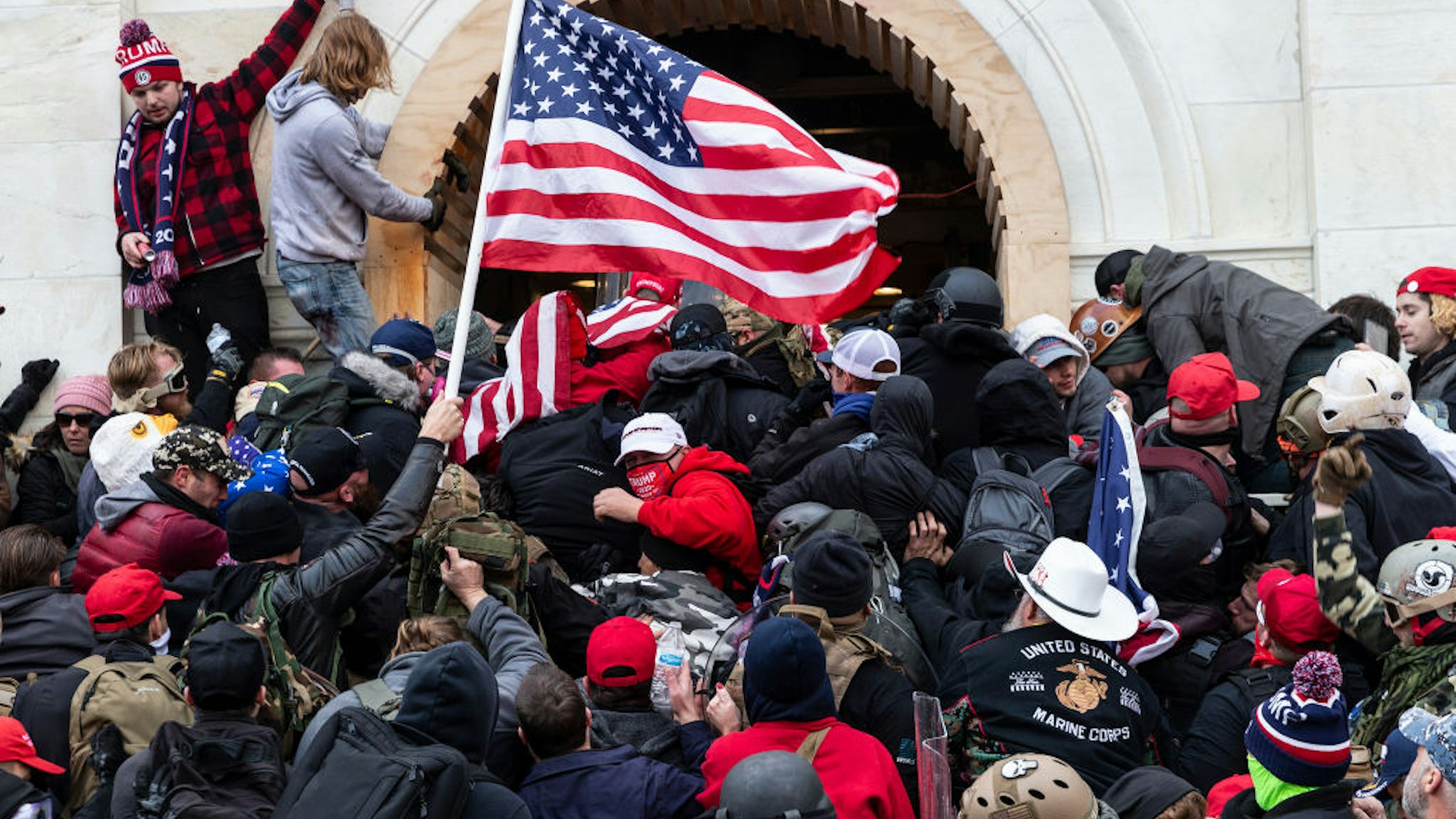Rioters clash with police trying to enter Capitol building