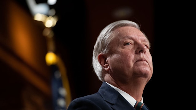 Senator Lindsey Graham, a Republican from South Carolina, listens during a news conference at the U.S. Capitol in Washington, D.C., U.S., on Thursday, Jan. 7, 2021.