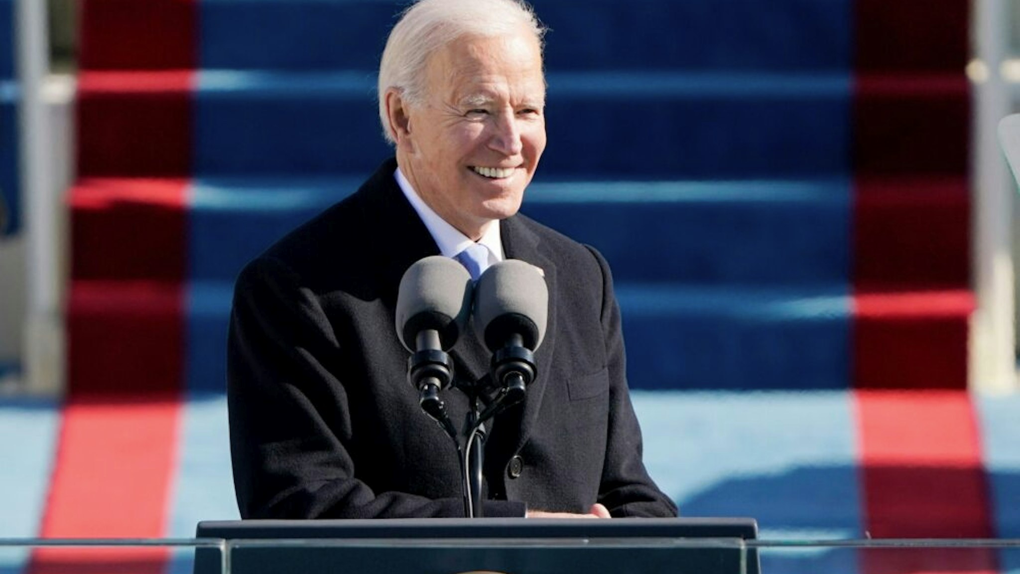 TOPSHOT - US President Joe Biden delivers his Inauguration speech after being sworn in as the 46th US President on January 20, 2021, at the US Capitol in Washington, DC.