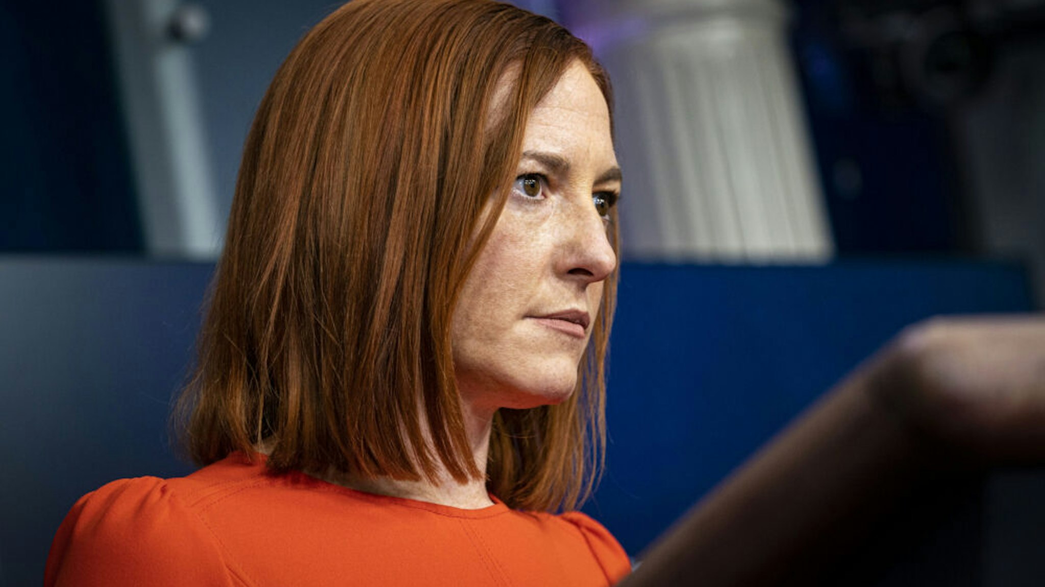 Jen Psaki, White House press secretary, listens during a news conference in the James S. Brady Press Briefing Room at the White House in Washington, D.C., U.S., on Thursday, Jan. 21, 2021. Biden in his first full day in office plans to issue a sweeping set of executive orders to tackle the raging Covid-19 pandemic that will rapidly reverse or refashion many of his predecessor's most heavily criticized policies.