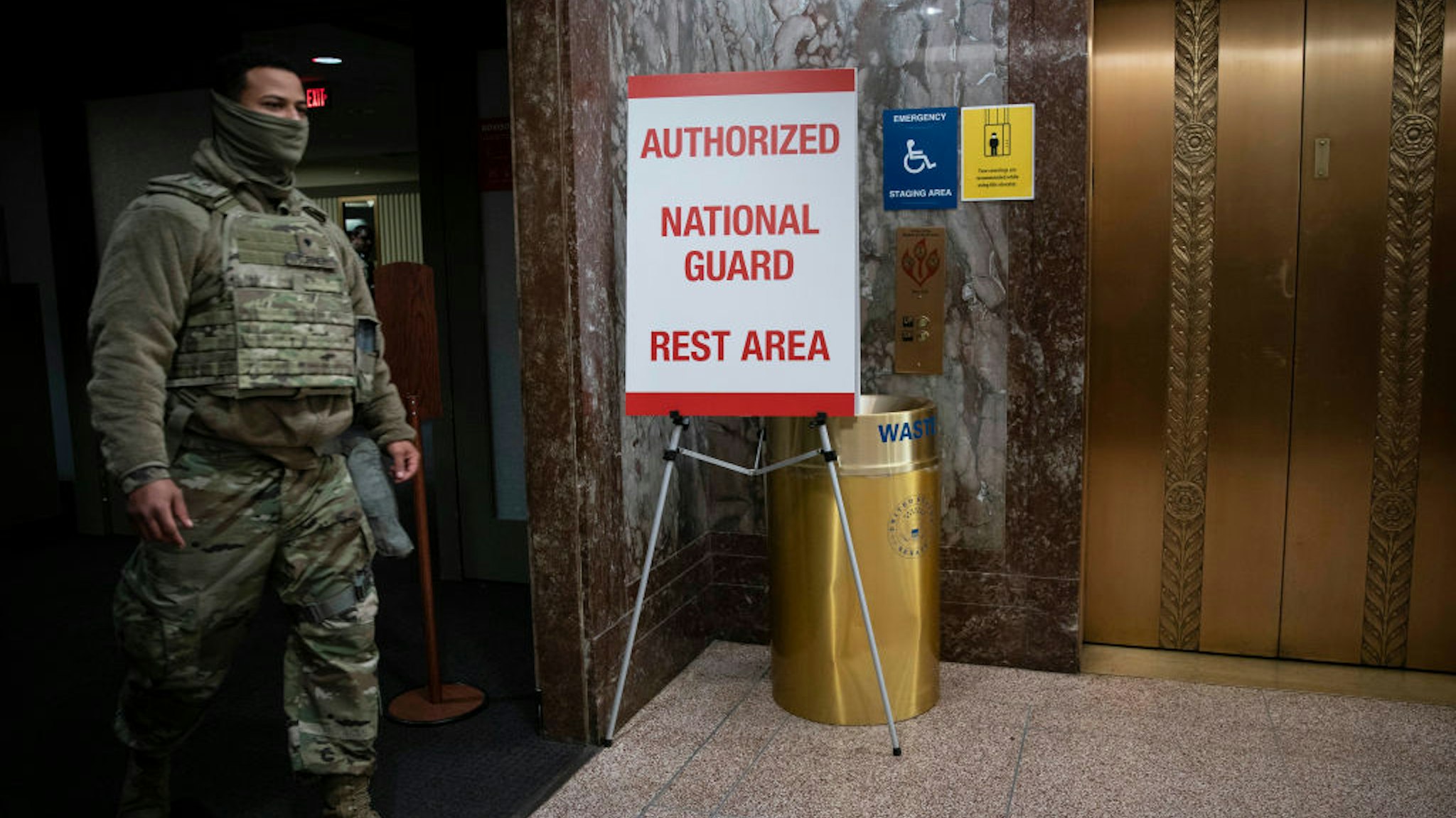 WASHINGTON, DC - JANUARY 22: A sign indicating a rest area for members of the National Guard is seen in the Dirksen Senate Office Building on January 22, 2021 in Washington, DC. News broke on Thursday that members of the National Guard have been forced to sleep in parking garages on Capitol Hill. (Photo by Sarah Silbiger/Getty Images)