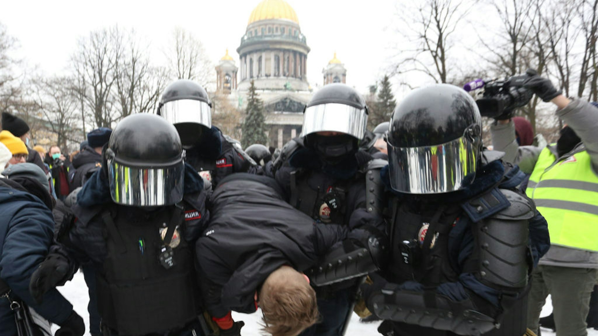 Police officers detain a protester during a rally in support of Alexei Navalny Politica in St. Petersburg, Russia, on January 23, 2021. Opposition politician Alexei Navalny has returned after poisoning from Germany to Russia and was detained at the airport in Moscow. (Photo by Valya Egorshin/NurPhoto via Getty Images)