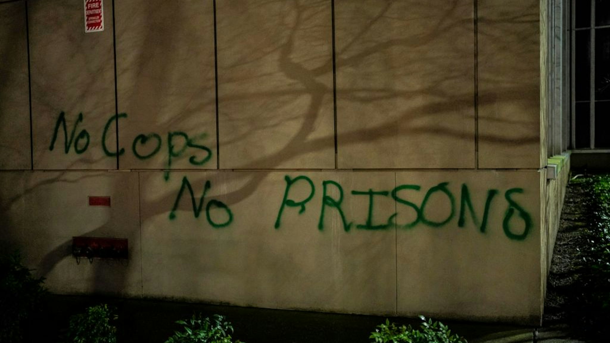 Graffiti is seen on the County-City Building during an anti-police protest on January 24, 2021 in Tacoma, Washington.